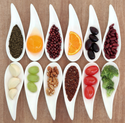 Foods that can help maintain a healthy liver, including garlic, broccoli, nuts and citrus fruits.